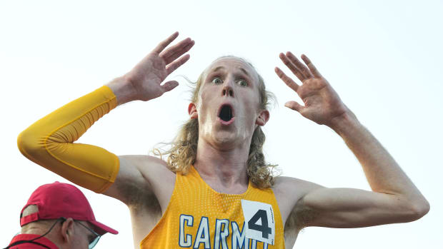 Carmel's Kole Mathison jokes with a friend after winning the 3,200 meter run Friday, June 2, 2023, during the IHSAA boys track and field state finals at Robert C. Haugh Track and Field Complex at Indiana University in Bloomington
